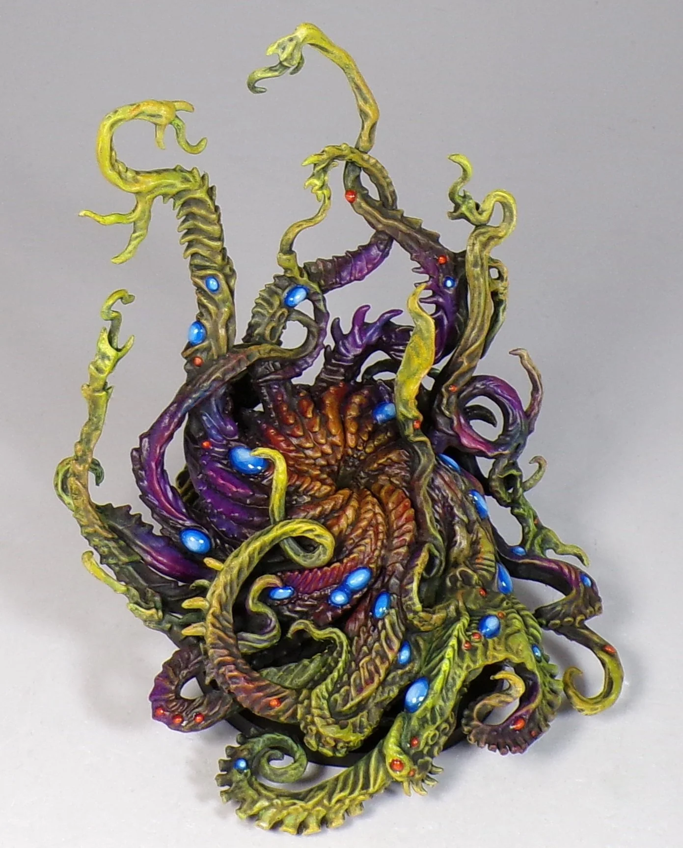 The towering Azathoth and frog-bat Tsathoggua god miniatures, painted to exhibition quality.